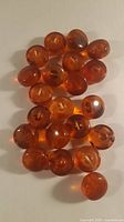 All 21 translucent amber round buttons laid out