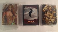 All three sealed packs: two sleeve packs and spacer pack