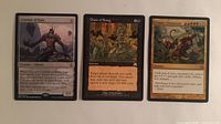 Front view of all three MTG cards