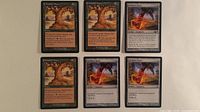 Overview of six cards: three Moment's Peace (top row), three Swiftfoot Boots (bottom row)