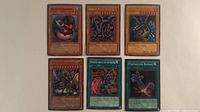 Overview of all six Yu-Gi-Oh! cards laid out