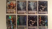 Eight cards laid out, showing both foil and regular versions