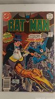 Front cover of Batman #287 comic book showing Batman and Penguin artwork