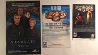 Three promotional posters laid side by side: Stargate SG-1, BioShock Infinite, BioShock 2