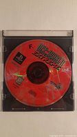 Front of Off-World Interceptor Extreme PS1 game disc in jewel case