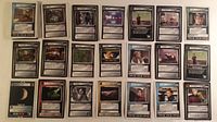 All 65 Star Trek CCG cards laid out in rows