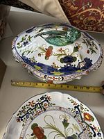 Oval soup terrene with lid and matching platter, showing Garofano pattern
