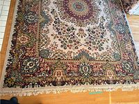 Top corner showing border design and fringe