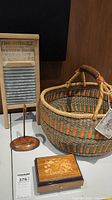 Photo of basket, music box, and washboard replica showing size and detail.