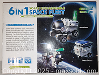 Box front showing six assembled space fleet models with solar panels and descriptive text explaining solar powering and rechargeable battery included.