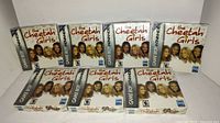Seven copies of The Cheetah Girls Game Boy Advance games, all brand new and sealed in original packaging, arranged side by side.