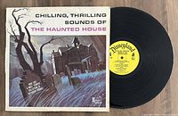 Front cover and vinyl record showing the original artwork and Disneyland label.