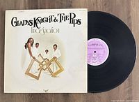 Photo showing the Gladys Knight & The Pips "Imagination" album cover alongside the vinyl record.
