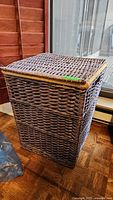 Wicker basket tall rectangular shape with lid closed shown from side and top