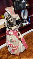 Pink and grey Callaway Solaire golf bag with headcovers