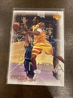 Front of 2000-01 Upper Deck Pros & Prospects Kobe Bryant basketball card #37 showing Kobe in mid-air.