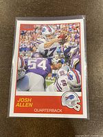 Front of the 2019 Panini Score Josh Allen card showing action photo and Buffalo Bills branding.