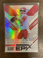 Front side of the 2019 Panini Score Patrick Mahomes II EPIX GAME INSERT Card #EG-3 showing holographic finish and player image.