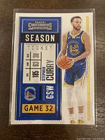 Front view of 2020-21 Panini Contenders Stephen Curry basketball card. Shows player image and season ticket design element.