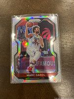 Front of 2020-21 Panini Prizm Marc Gasol silver prizm basketball card featuring action shot and team logo.