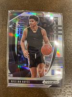 Front view of 2020 Panini Prizm Killian Hayes Silver Prizm Rookie Card #12 showing holographic silver prizm design and player image.