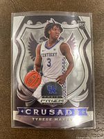 Front side of the 2020 Panini Prizm Tyrese Maxey Crusade Rookie Card #94 Kentucky showcasing the player and design