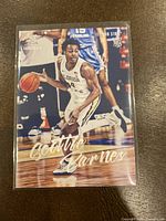 Front view of the 2021 Panini Chronicles Luminance Draft Picks Scottie Barnes rookie basketball card showing player in Florida State Seminoles uniform.