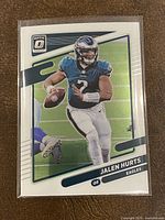 Front view of the 2021 Panini Donruss Optic Jalen Hurts football card showing player in Philadelphia Eagles uniform with design and card number 9.