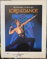 Full view of Michael Flatley Lord Of The Dance mounted poster showing the dancer in a dynamic pose with the title text at the top and signature and numbering at the bottom white border.