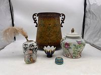 Full view of all six decorative items arranged in a row on white surface