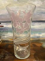 Full view of vintage glass vase with pink floral etching, showing overall shape and design.
