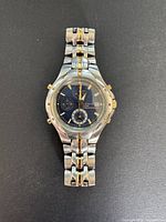 Front view of vintage Yema men's chronograph watch showing two-tone bracelet and blue dial.