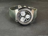 Front angle view of Tissot men's chronograph watch showing dial and strap.