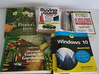 Group of gardening, finance and Windows 10 books plus spiral organizer