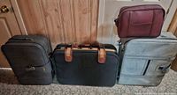 Group view; Fashionlite suitcase positioned second from left for size reference