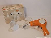 Hair dryer, stand, nozzle, box overview