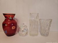 Group shot of all four glass and crystal vases showing size and style differences