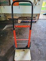 Hand truck upright showing overall structure, handle, frame and toe plate