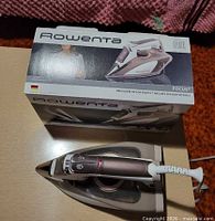 Rowenta Focus iron top view beside its box