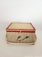 Closed wicker sewing box front view