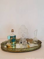 All items on tray showing tray design, perfume bottles and stoppers