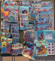 Full spread of all items in the Disney Elena of Avalor party lot showing packaging and contents layout.