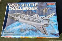 Front of original Monogram Space Shuttle Challenger model kit box with space shuttle artwork.