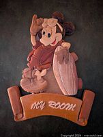 Front view of the wooden wall sign featuring Surfer Mickey Mouse holding a surfboard with 'My Room' engraved on a banner below.