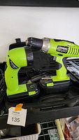 Photo of Kawasaki cordless drill 19.2V with two handles, extra battery packs in carrying case