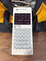Full view of Allen Bradley Pocket Programmer showing keypad and display