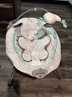 Top view of Fisher-Price baby chair showing soft bunny design seat and padded sides.