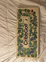 Full view of CribbGolf game board with golf course artwork.