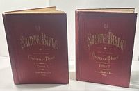 Both volumes upright showing front covers side by side