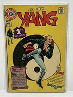 Front cover of the comic showing character Yang performing a kick with yin-yang symbol background and 1st Edition badge.